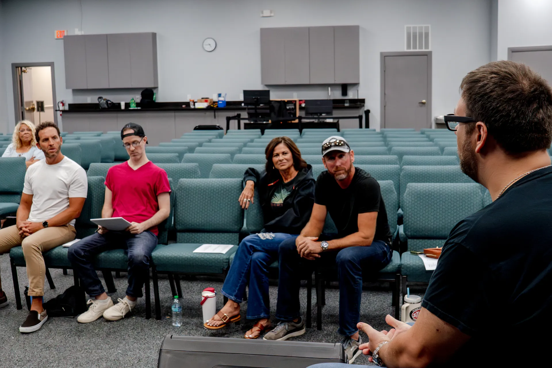 Coach Mike teaching seated participants during an improv training session on Florida's Treasure Coast