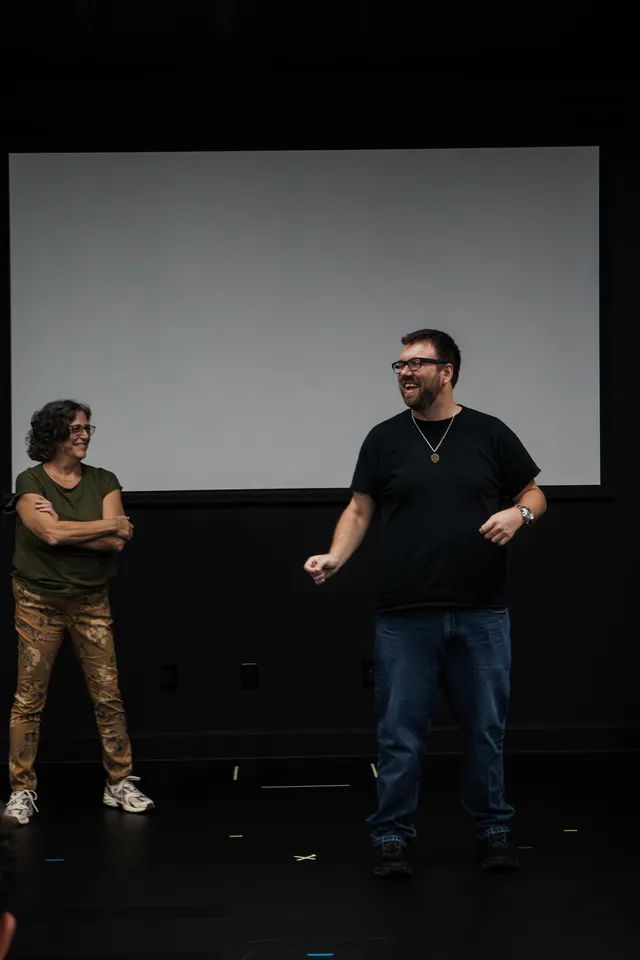 Coach Mike and a class participant practicing an improv acting scene on the Treasure Coast