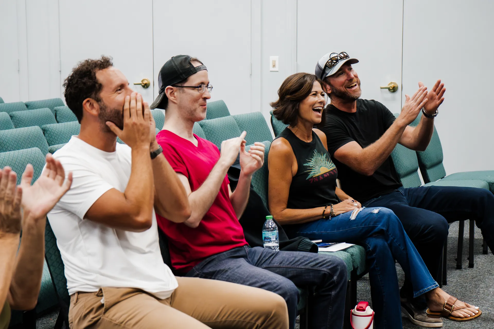 Participants laughing during a Silly Goose Comedy improv workshop in Stuart, Florida
